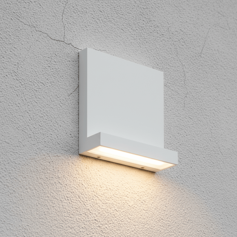 Close-up of the Pace White LED Wall Light mounted on a textured wall, showcasing its sleek design and warm light.