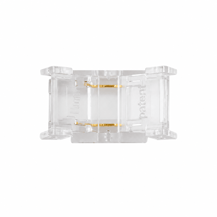 Clear fast connector for 8mm LED strip lights, featuring gold contacts for reliable connections.
