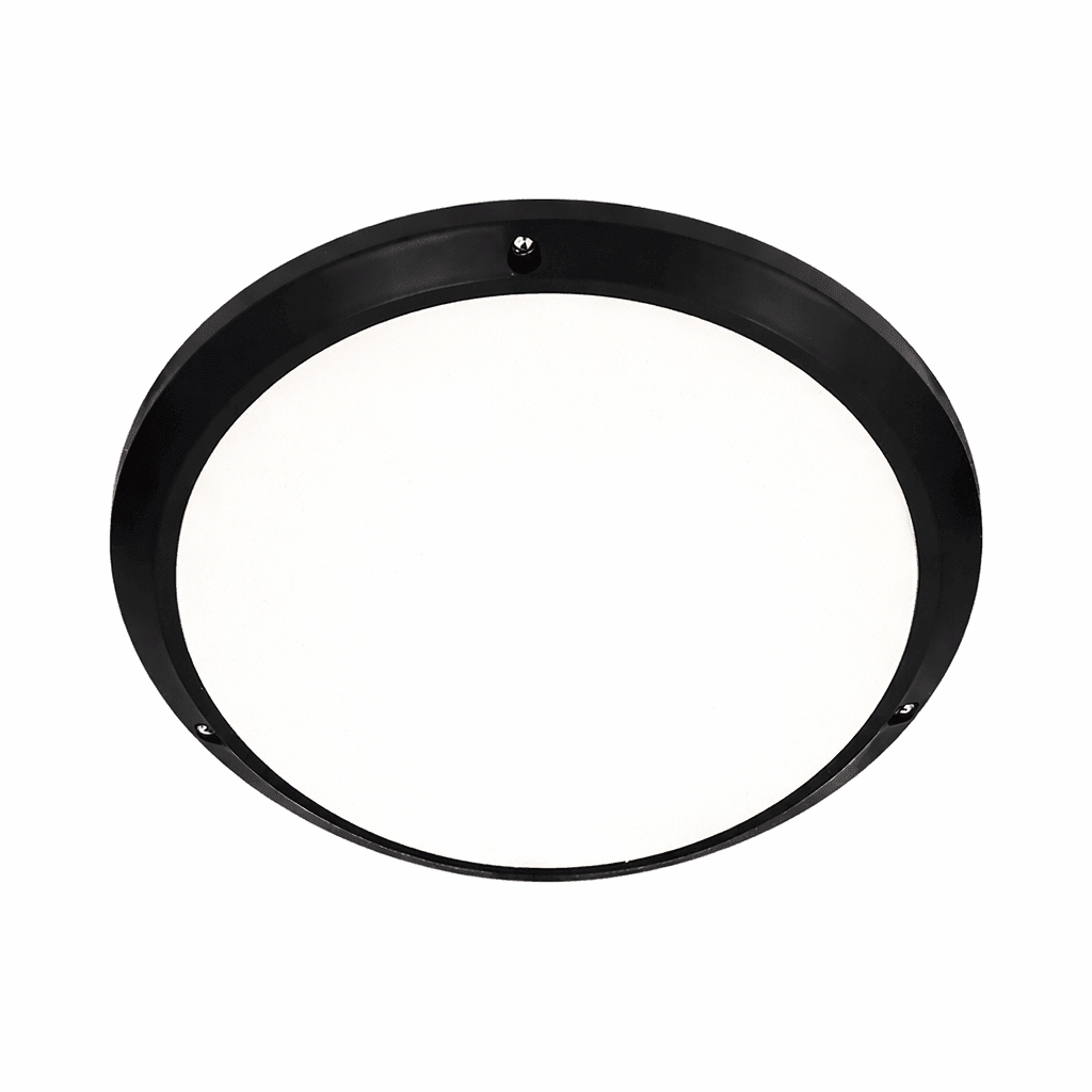 Black outdoor wall light on a modern hotel or guest-house entrance at dusk