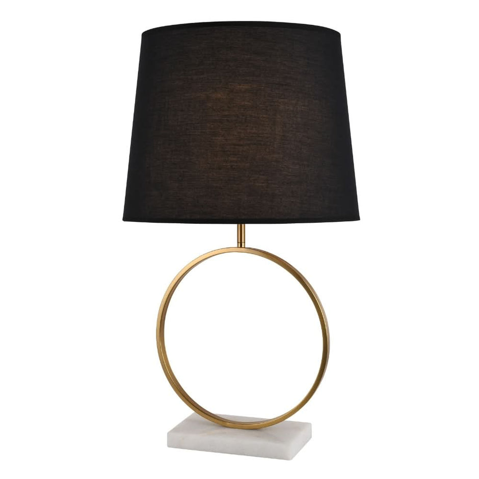 Elegant black and gold marble table lamp beside a refined home office desk