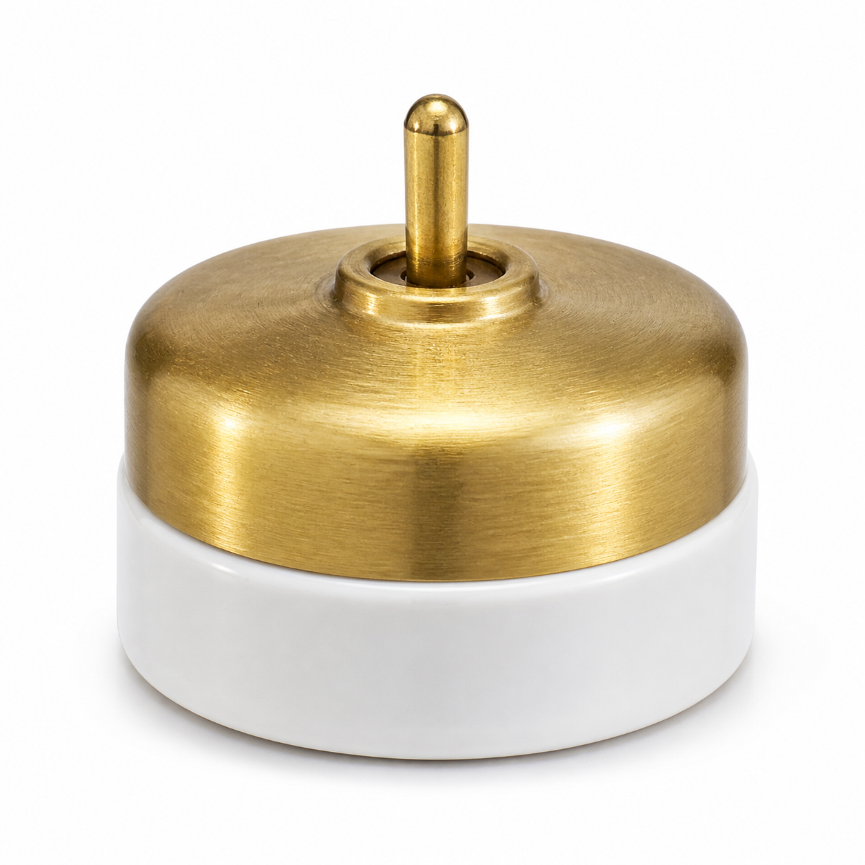 Brass and porcelain switch for a modern heritage interior