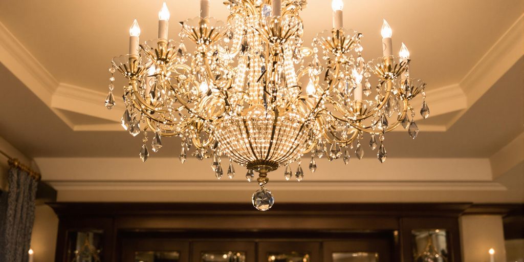 Elegant chandelier above a stylish dining table.