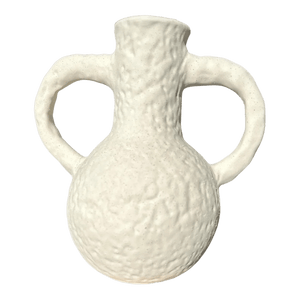 A textured white ceramic vase with two handles, featuring a rounded body and a narrow neck.