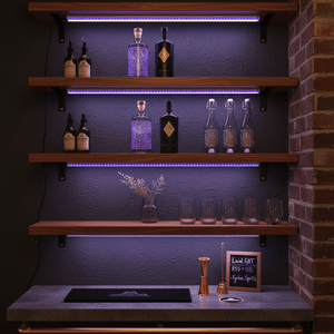 Shelves with bottles and glasses against a dark wall with UVA LED lighting