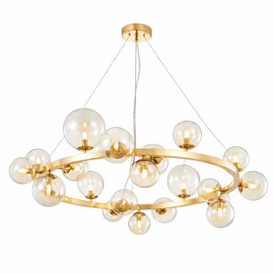 Gold chandelier with multiple glass globe lights on a white background