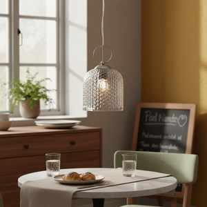 Chestnut Glass Pendant light hanging over a dining table set with pastries and drinks, featuring a warm ambiance.