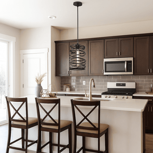 Modern kitchen with dark wood cabinets, white countertops, and a pendant light.