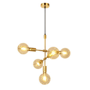 Gold pendant light with five clear glass bulbs arranged asymmetrically, suspended from a ceiling mount by a black cord.