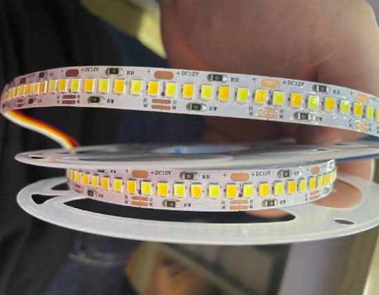 Close-up of CCT LED strip light with visible LEDs and circuitry.