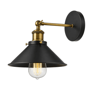 Rustic black conical shade with antique brass arm and exposed filament bulb on a circular wall plate.