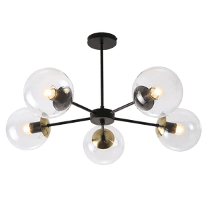 Five-light pendant featuring a black metal frame with antique brass accents and clear glass globes.