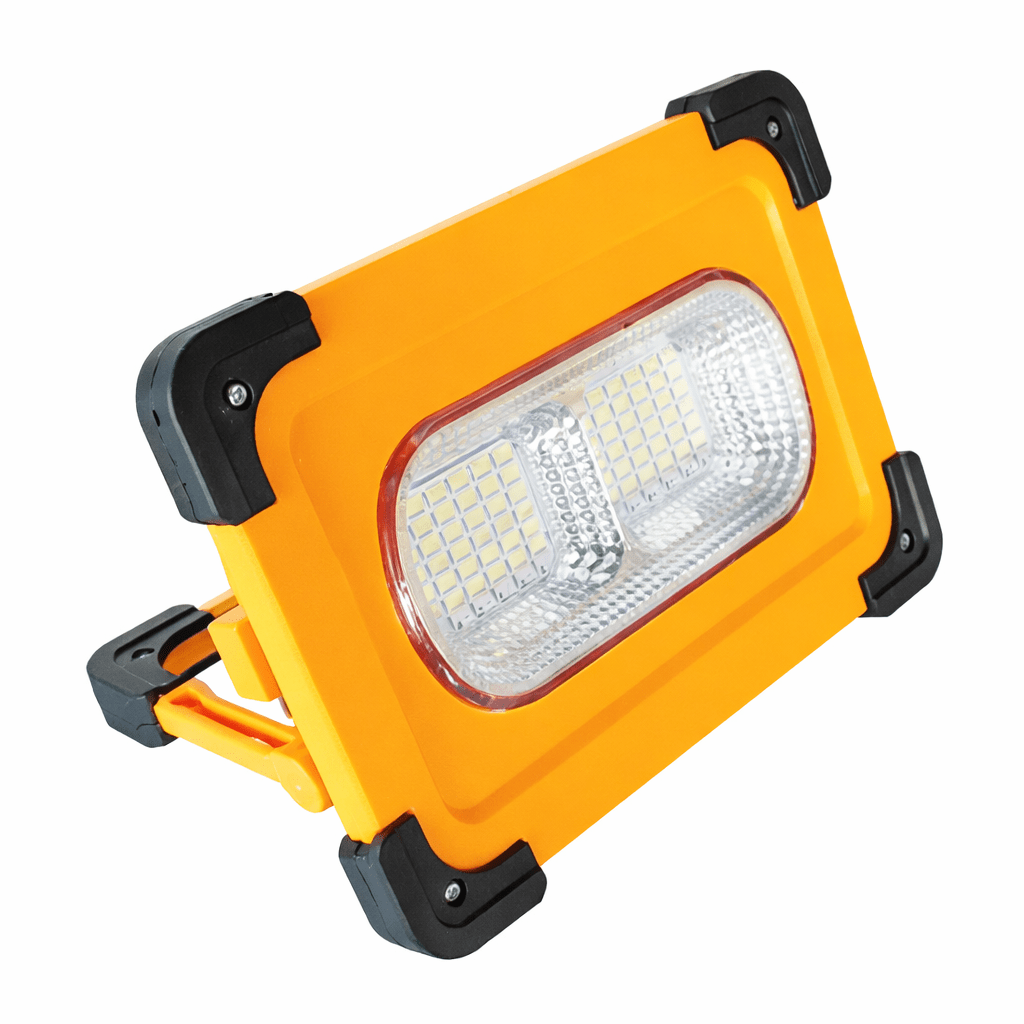 Yellow and black portable work light on a white background