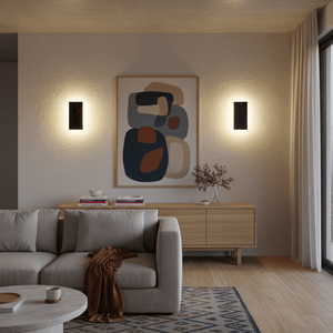 Modern living room with a gray sofa, coffee table, and abstract art on the wall.