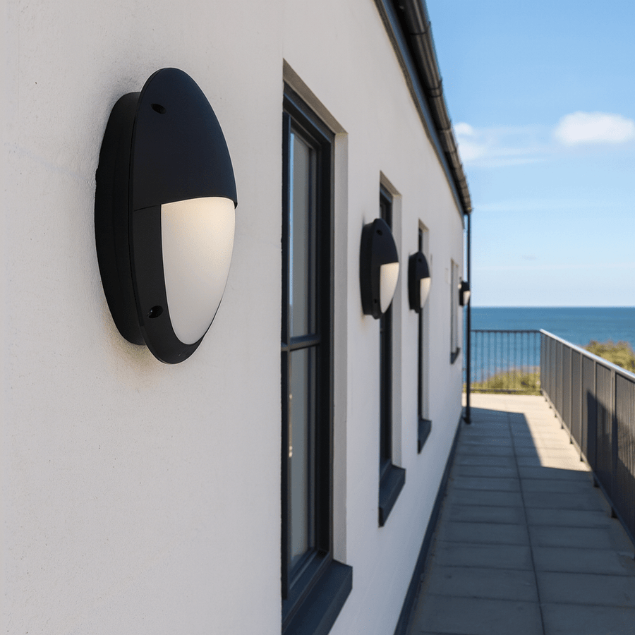 Types of outdoor wall lights in Cape Town, solar wall light on a realistic garden boundary wall, practical exterior lighting for pathways, warm LED glow and realistic shadow falloff, balanced 800x800 composition with olive and brass accents