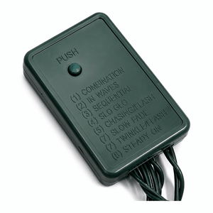 Close-up of the control box for LED fairy lights, featuring mode options and a green finish.