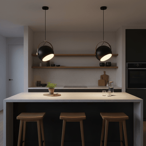 Two black leather strap pendant lights hang over a modern kitchen island with wooden stools.
