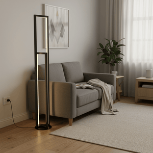 Modern black LED floor lamp beside a grey sofa in a cozy living room setting.