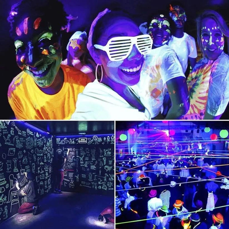 Black light bulb creating UV glow effects on fluorescent colours and decor