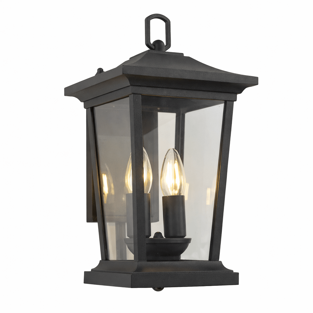 Black outdoor lantern with clear glass panels on a white background