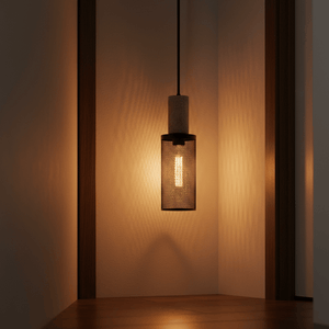 Close-up of the Midnight Long Mesh & Stone Pendant Light, showcasing its textured metal mesh and stone detail, softly