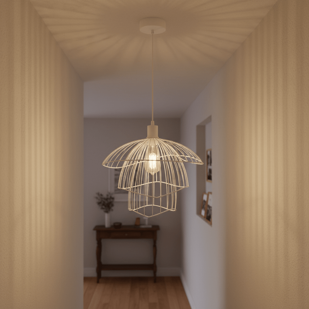 Stylish white pendant light hanging in a hallway, casting intricate shadows on the walls.