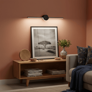 Black slim LED linear light mounted above a framed black-and-white photo on a wooden console table.
