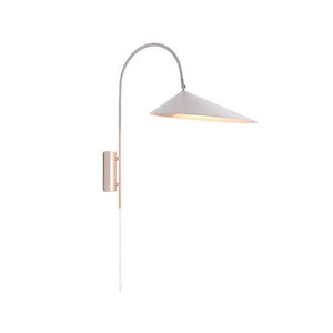 Modern white corded wall light with a sleek conical shade and adjustable arm, mounted on a wall.
