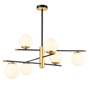Black and satin gold chandelier with six white globe lights, featuring a modern, geometric design.