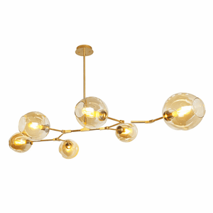 Satin gold horizontal pendant light with six amber glass shades, showcasing a modern molecule design.