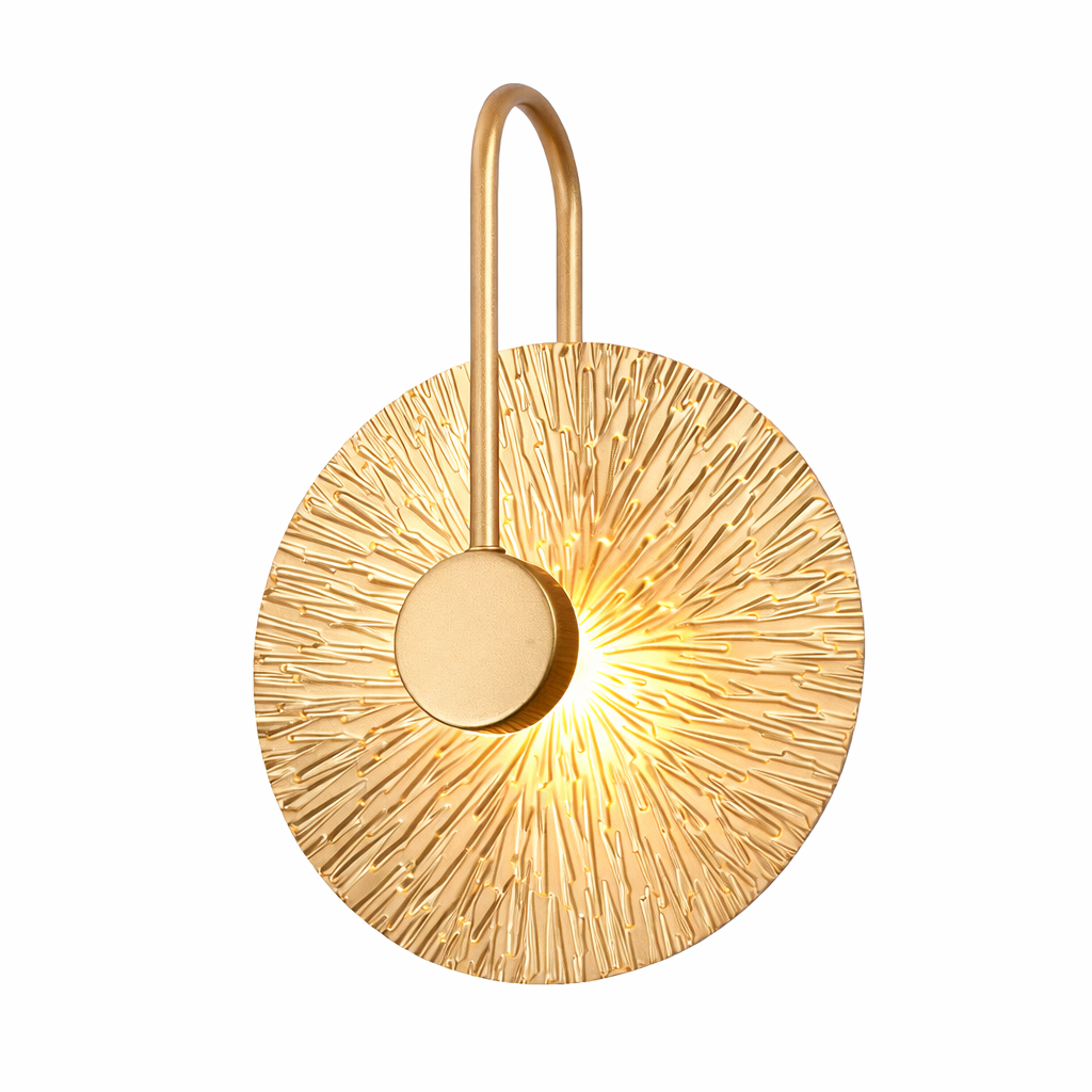 Gold circular wall light fixture on a white background