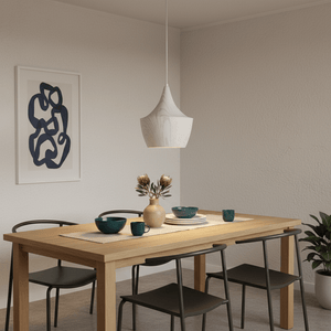 Ziggy White Wood Grain Pendant Light hanging over a dining table set with teal dishes and a vase of flowers.