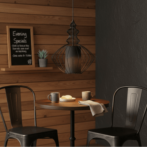 Tokyo 2 Black Wire Frame Pendant light hanging above a small wooden table with two chairs, featuring coffee mugs and a