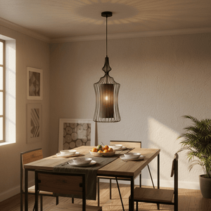 Tokyo 1 Black Wire Frame Pendant light hanging over a dining table set with plates and a fruit bowl.