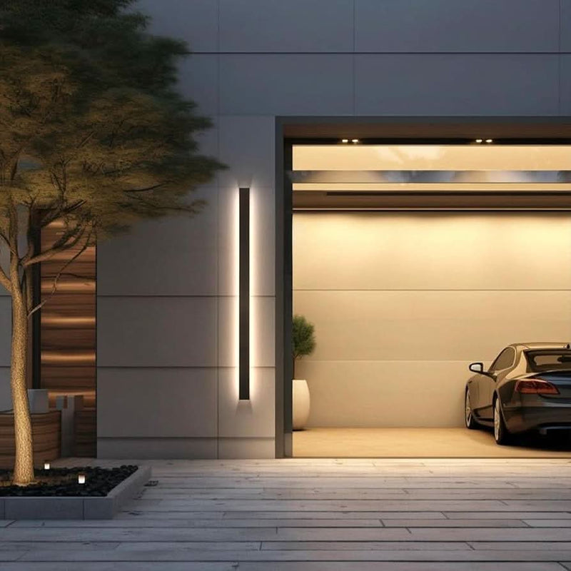 Contemporary wall lights on double garage exterior