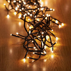 String of lights on a wooden surface