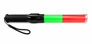 Flashlight with green and red accents on a white background