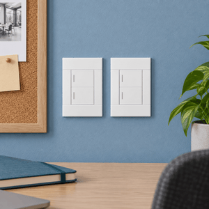 Veti 2 White Two Lever Wall Switch in a realistic dusty-blue meeting room setting