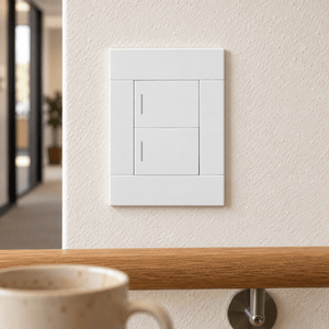 Veti 2 White Two Lever Wall Switch in a realistic warm plaster corridor setting