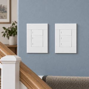 Veti 2 White Three Lever Wall Switch in a realistic dusty blue-grey stair landing setting