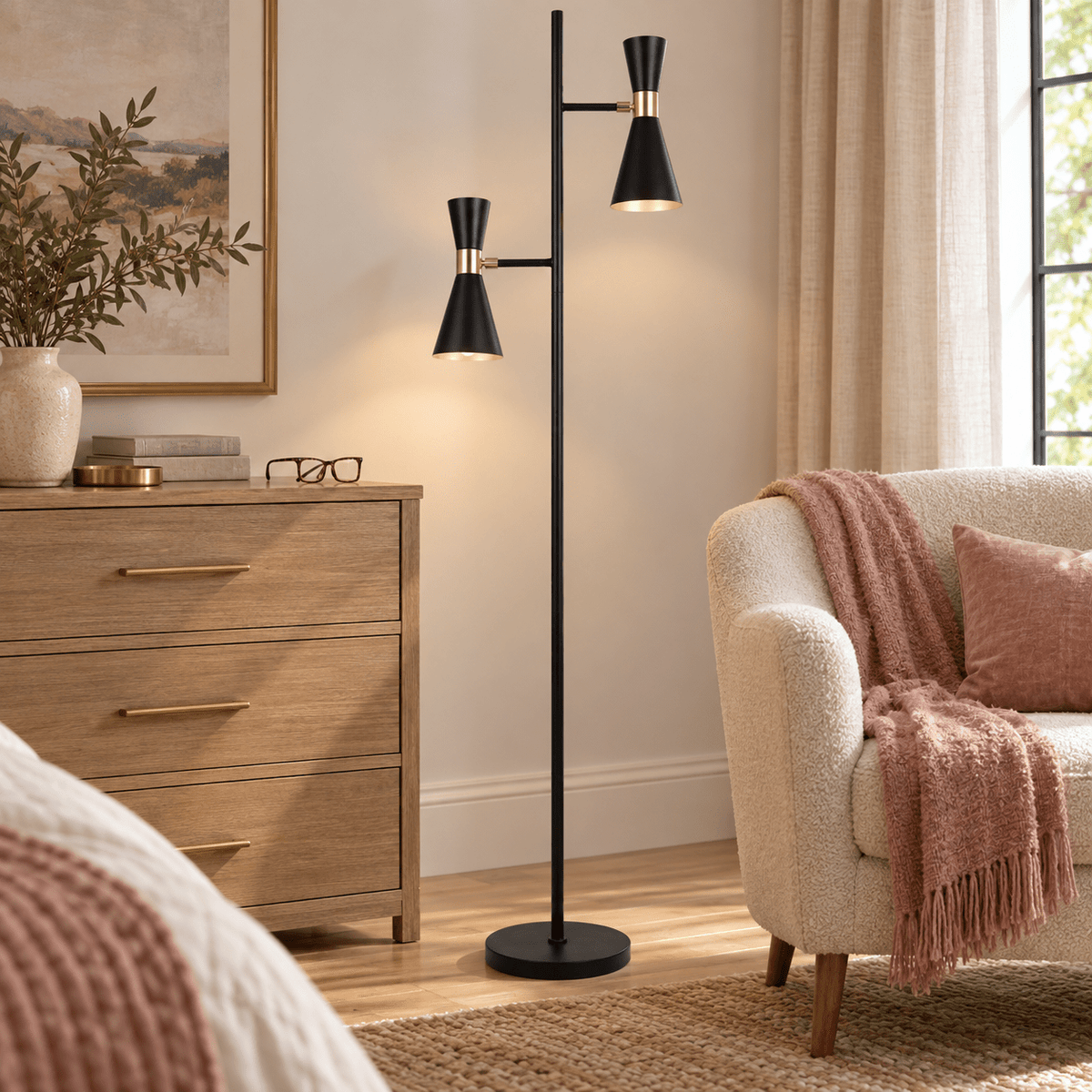 Carrington 2 Light Black and Gold Floor Lamp in a realistic clay-pink bedroom setting