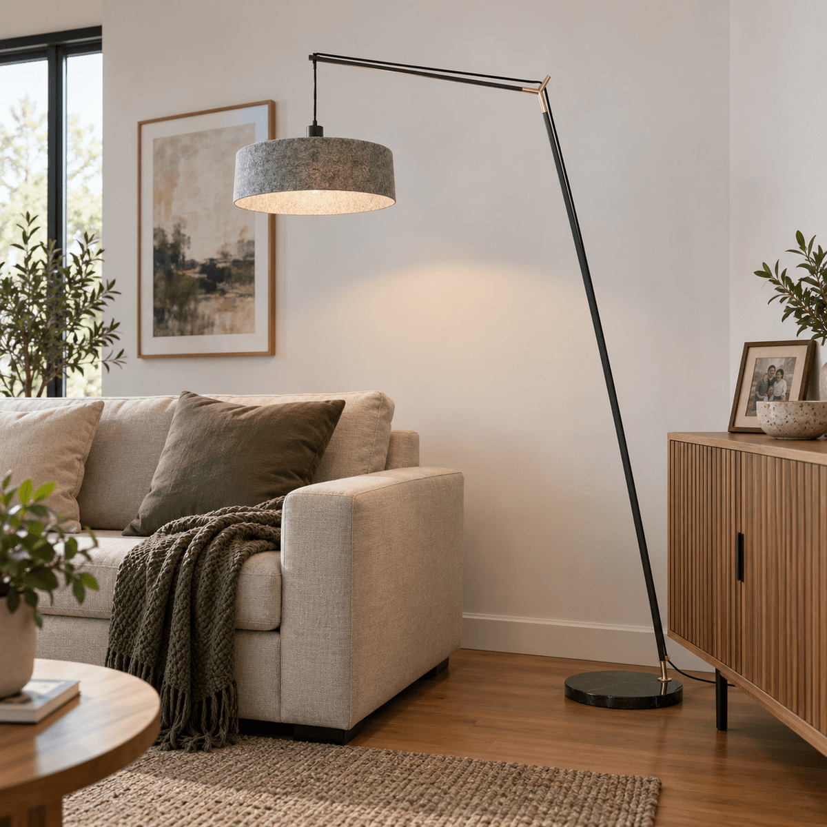 Moonwalker Marble & Felt Floor Lamp lifestyle image: Living room accent near a neutral sofa