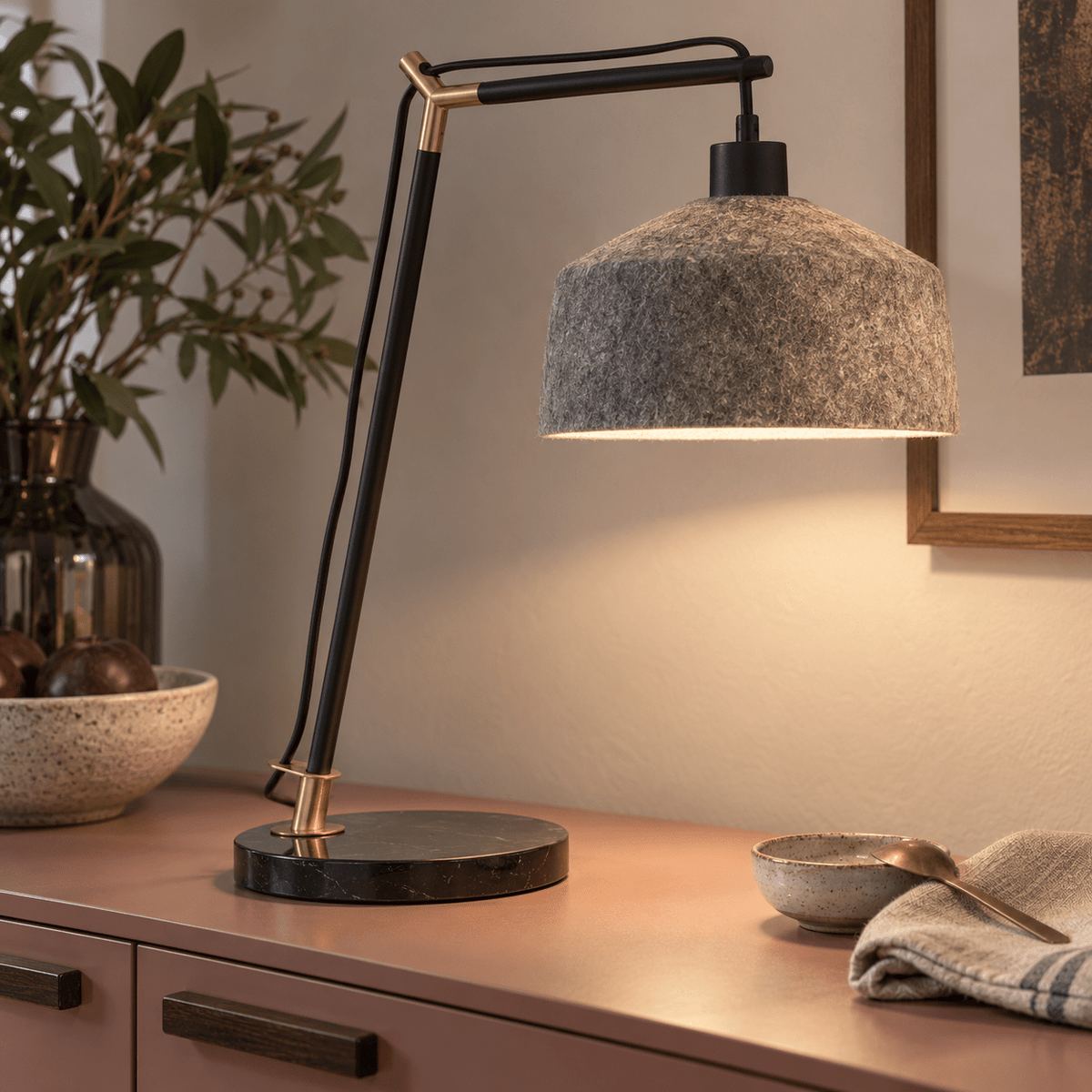 Moonwalker Marble & Felt Table Lamp lifestyle image: Close-up detail of felt shade glow on marble
