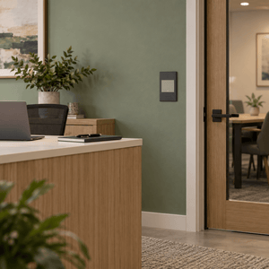 Veti 3 - One Lever Bell Press Switch - Titanium / Graphite lifestyle: Office reception wall with calm functionality