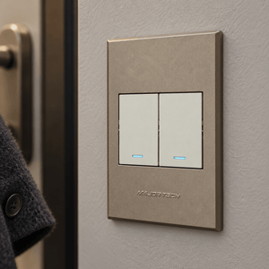 Veti 3 - Two Lever Bell Press - Titanium / Bronze lifestyle image: Close detail of the flush two-lever face and locator glow