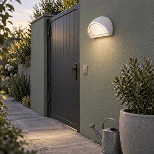 White Aluminium Wall Light with Frosted Glass IP54 lifestyle image: Patio wall accent near a side gate