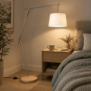Cantilever Floor Lamp with Foot Switch & White Shade lifestyle image: Evening bedroom corner with sage bedding