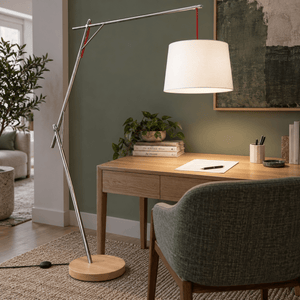 Cantilever Floor Lamp with Foot Switch & White Shade lifestyle image: Overhead task at a small lounge desk (lamp ON)