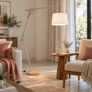 Cantilever Floor Lamp with Foot Switch & White Shade lifestyle image: Sofa side in morning light with subtle warm lamp glow