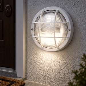 Round PVC Grid Bulkhead - Clear Glass IP44 - White lifestyle image: Close construction view near the doorframe