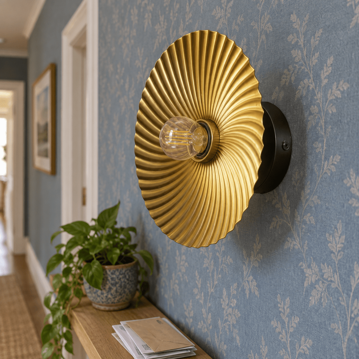 Alexander Indoor Wall Light — PROMPT 3 — Close-up on lounge corridor wall with muted blue wallpaper